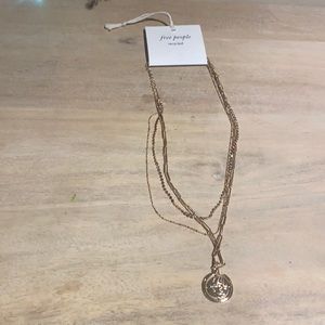 Free people neckles 3 combined to one with rose medalion